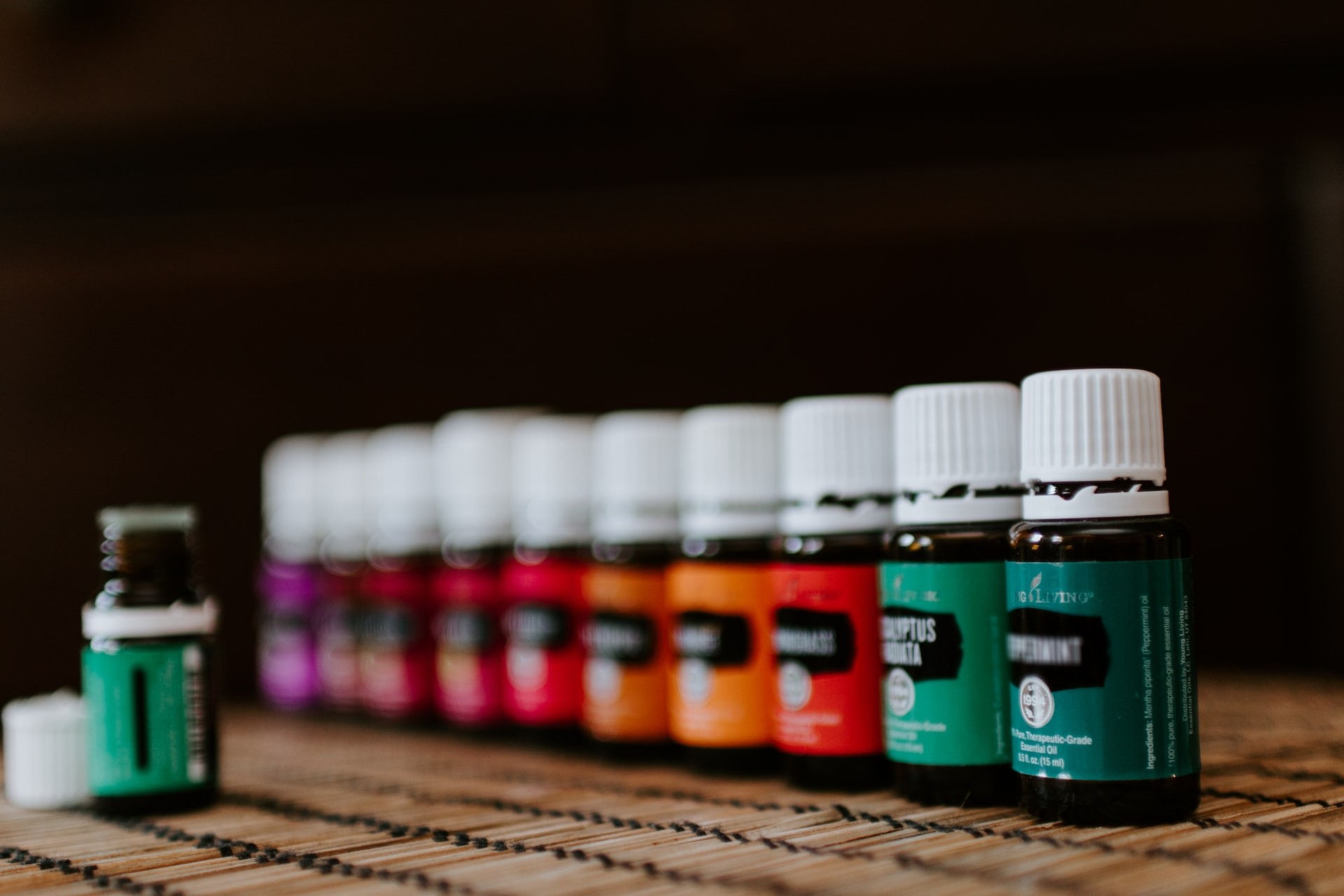 bottles of essential oils in a line
