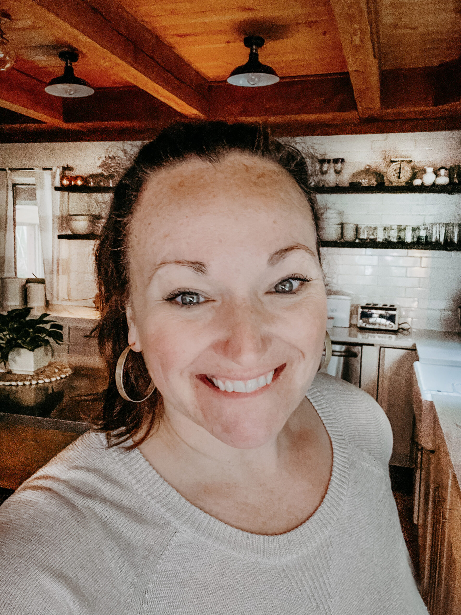 Jess Buttermore standing in her kitchen