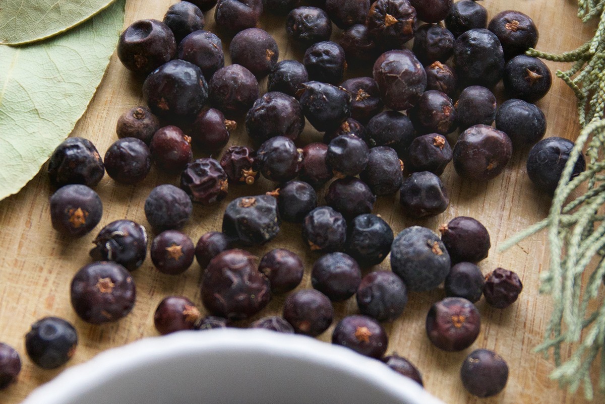 juniper berries on a wooden table