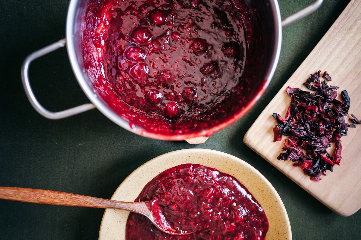 hibiscus jam in a pan and a bowl