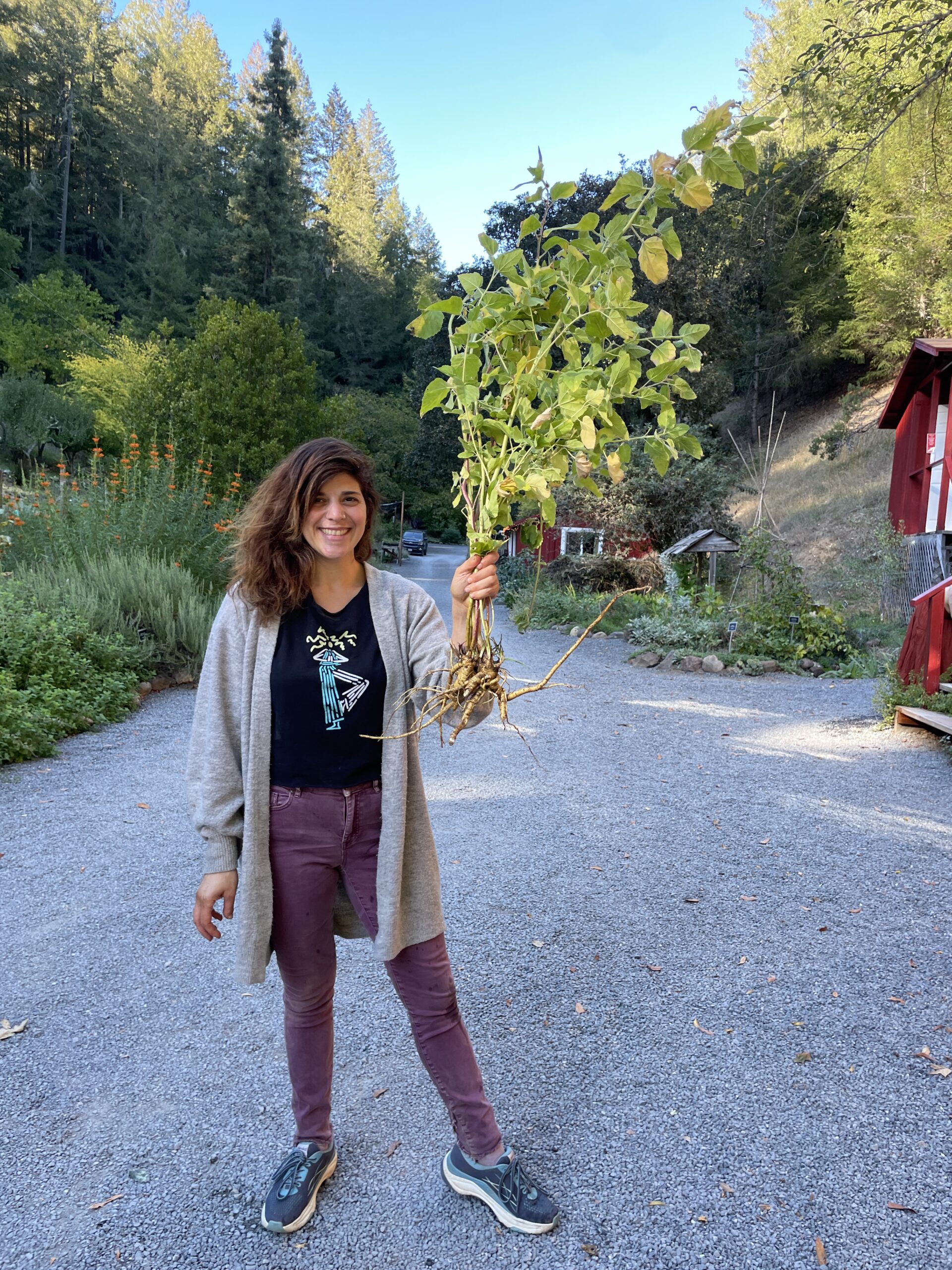Laura Rubin holding a plant