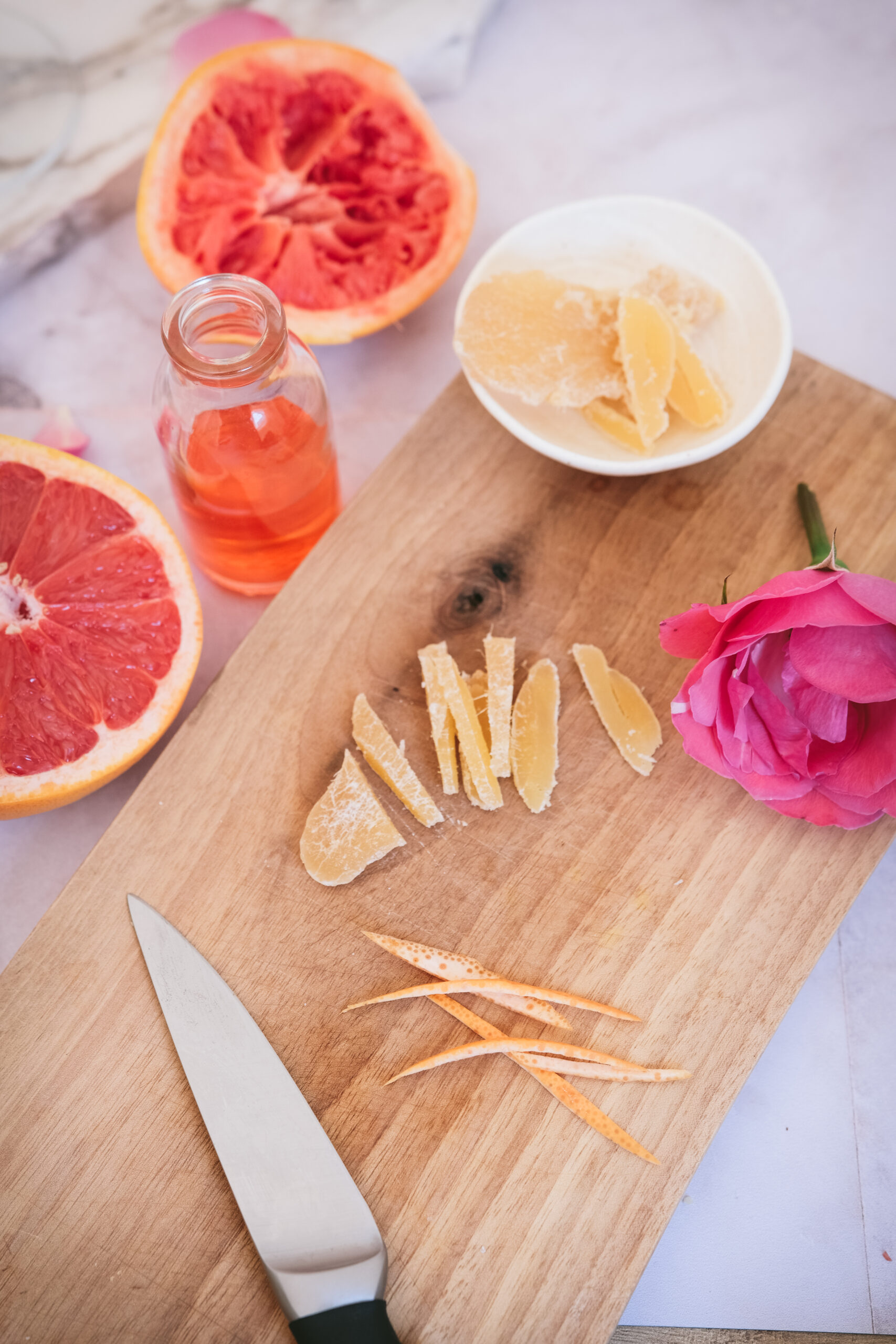 sliced ginger on a cutting board