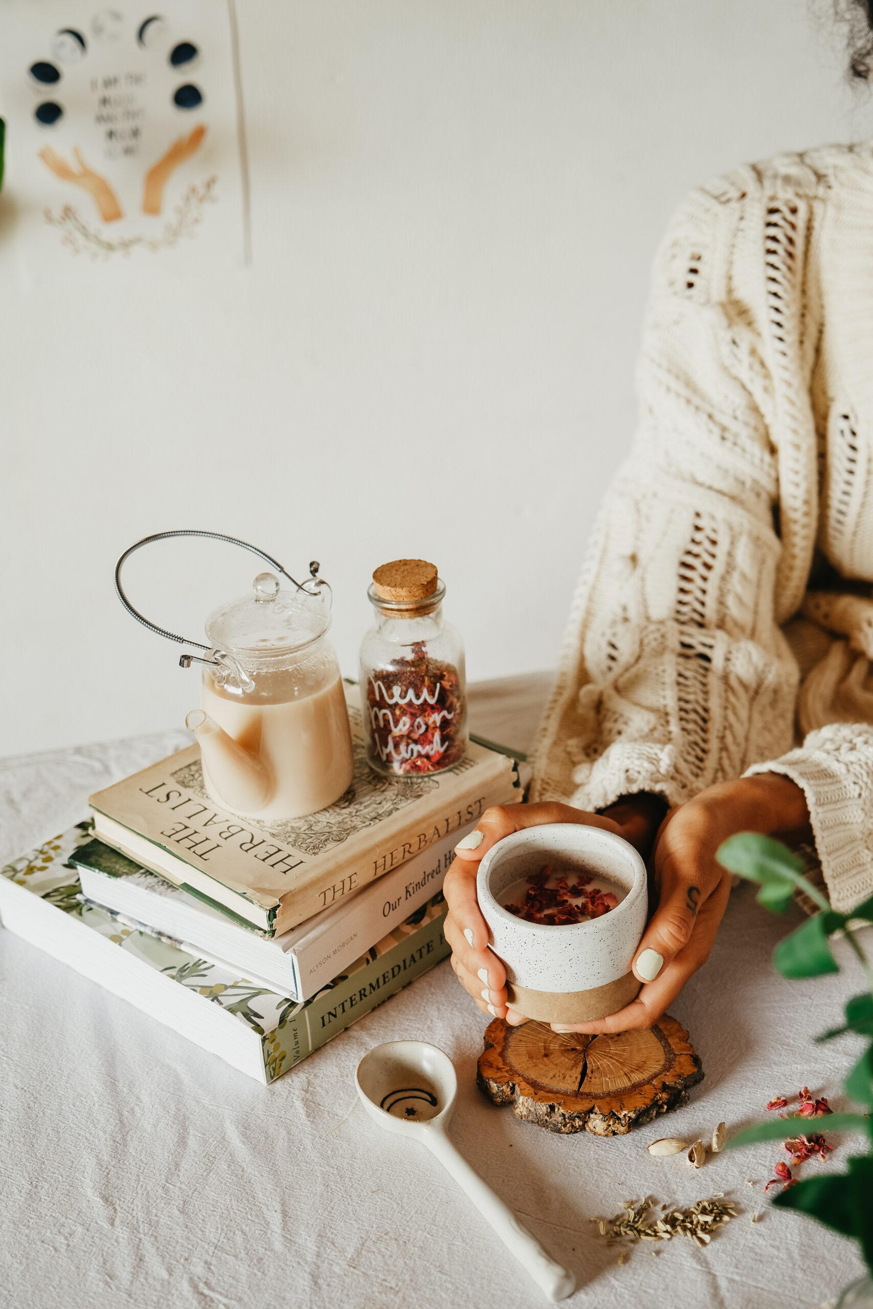 herbalist holding a cup of New Moon Herbal Milk