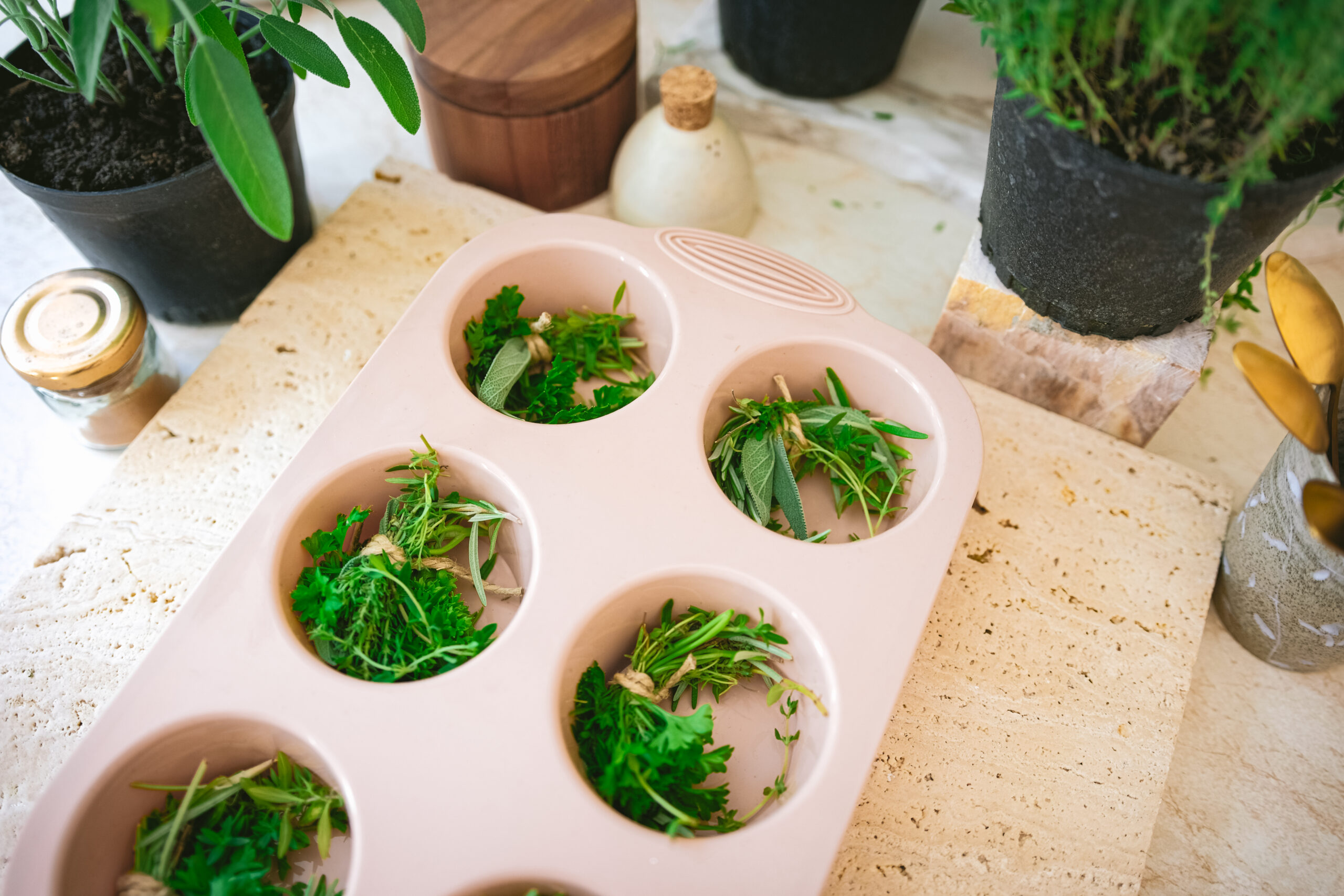 bundles of summer garden herbs in a silicone mold