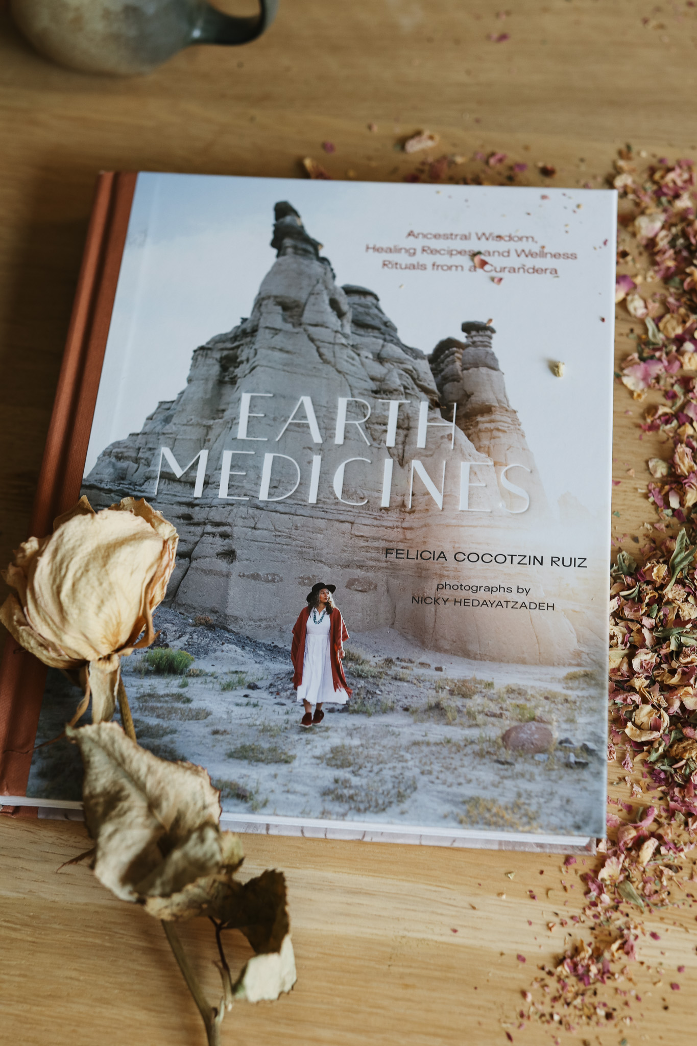 Earth Medicines book on a table