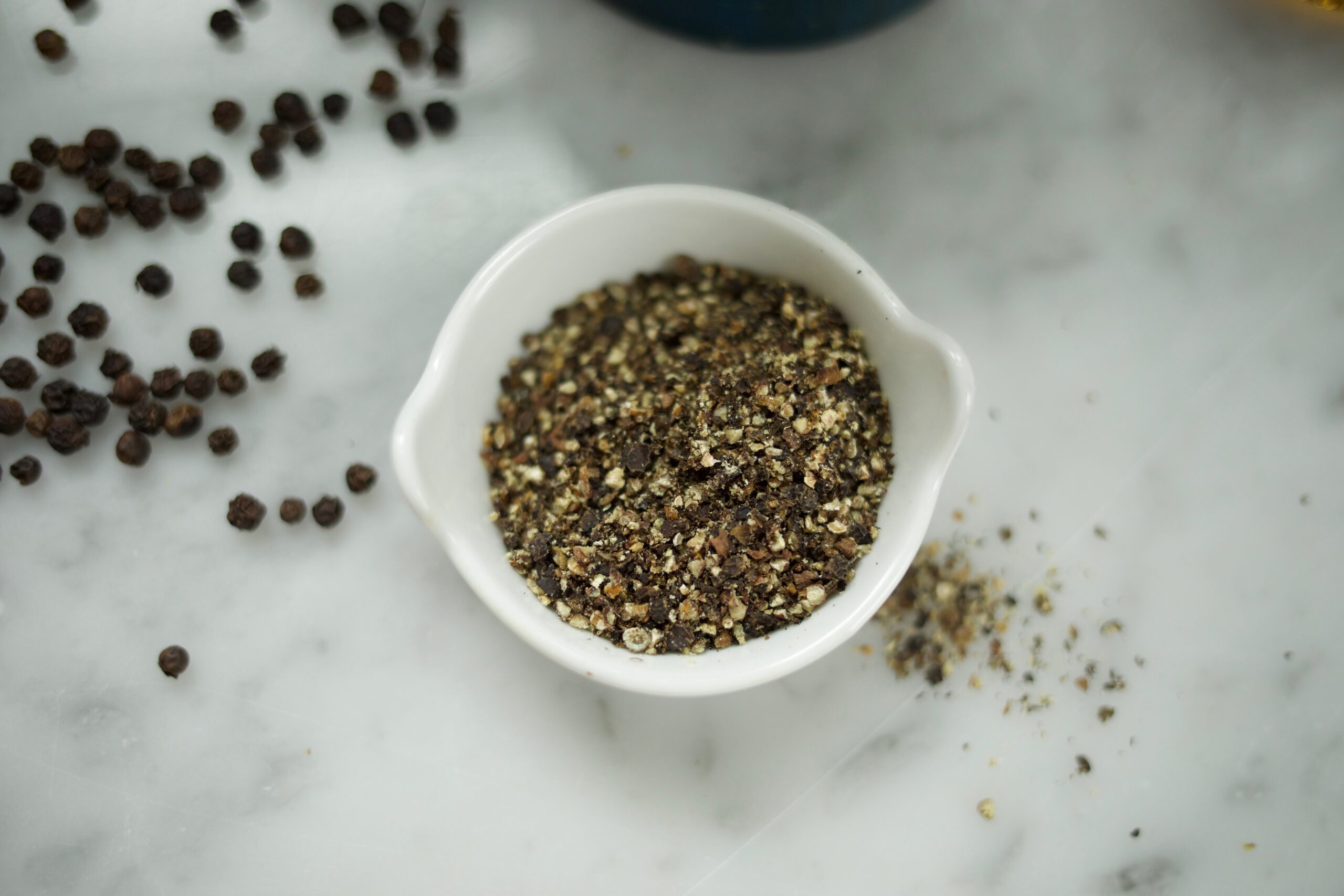 black pepper in a glass bowl