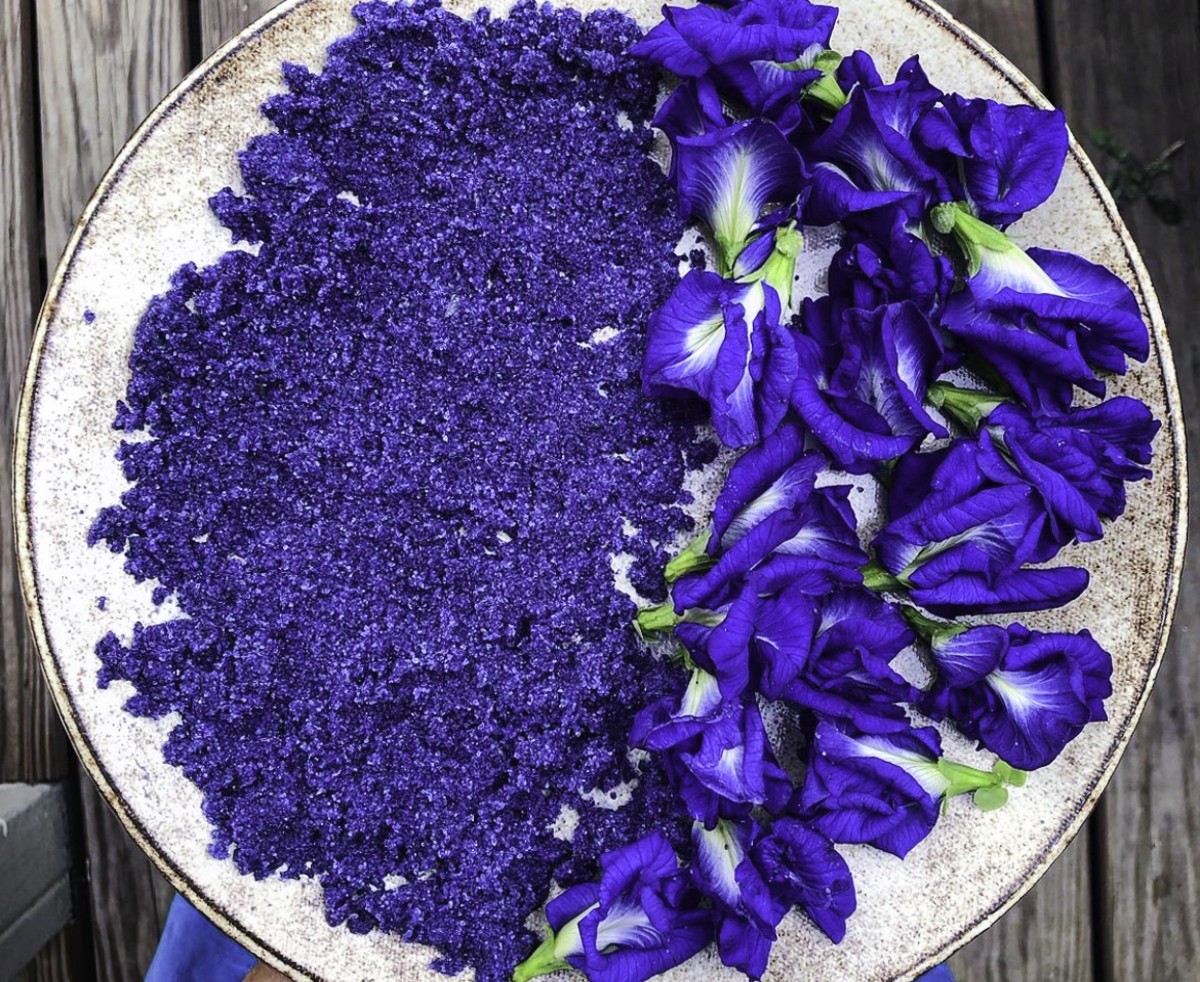 powdered and fresh flowers on a plate