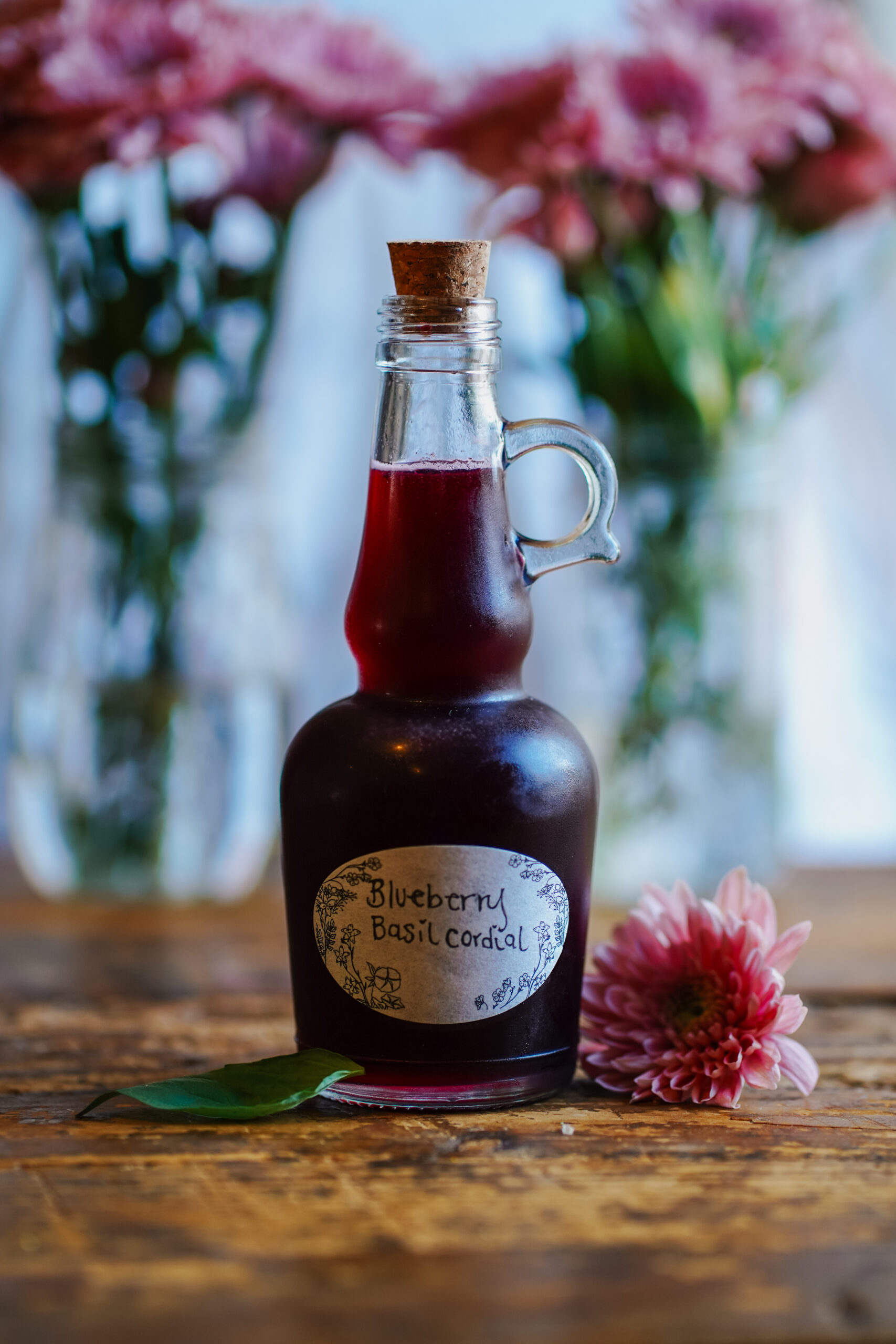 blueberry basil cordial in a bottle