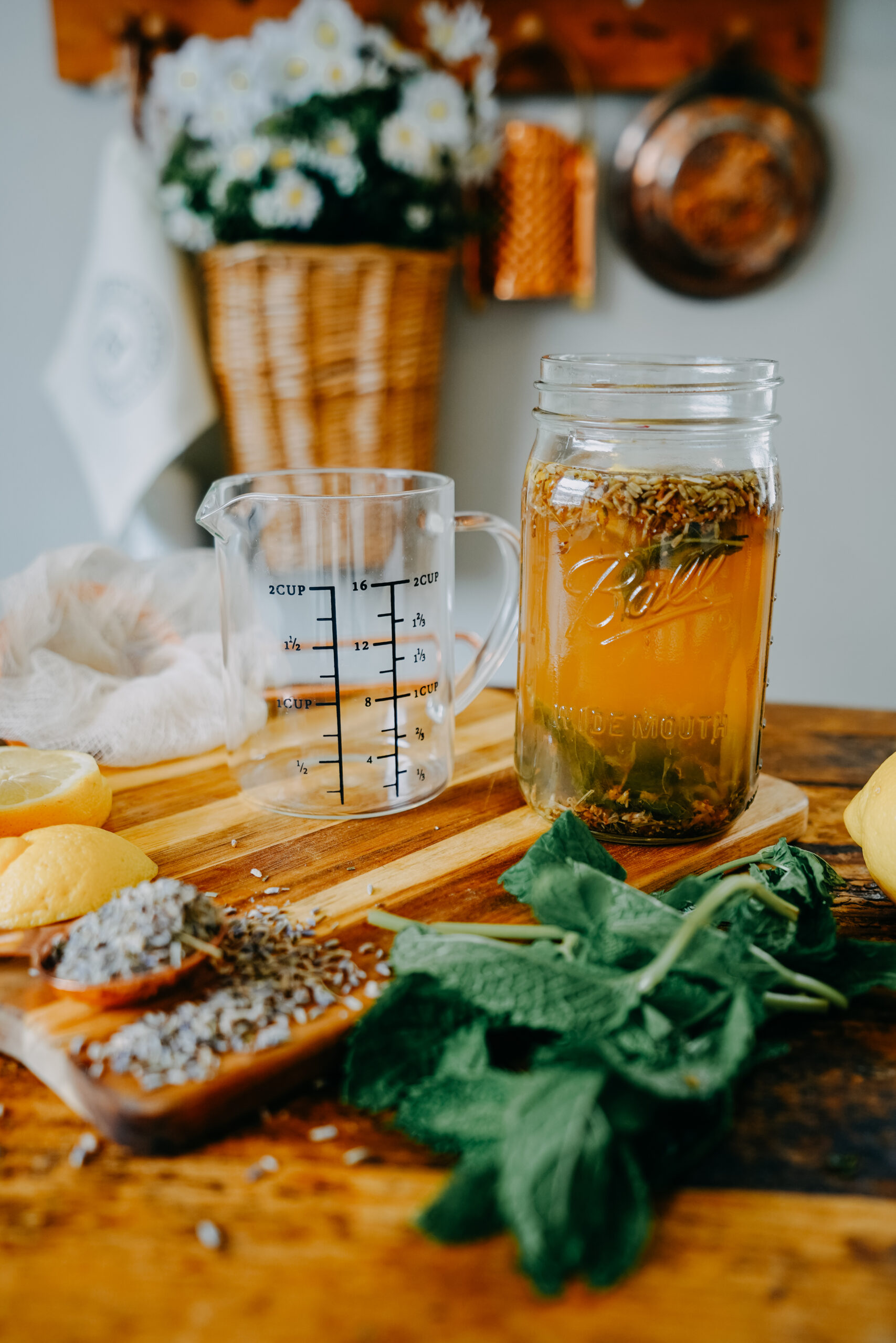 herbs steeping in a mason jar