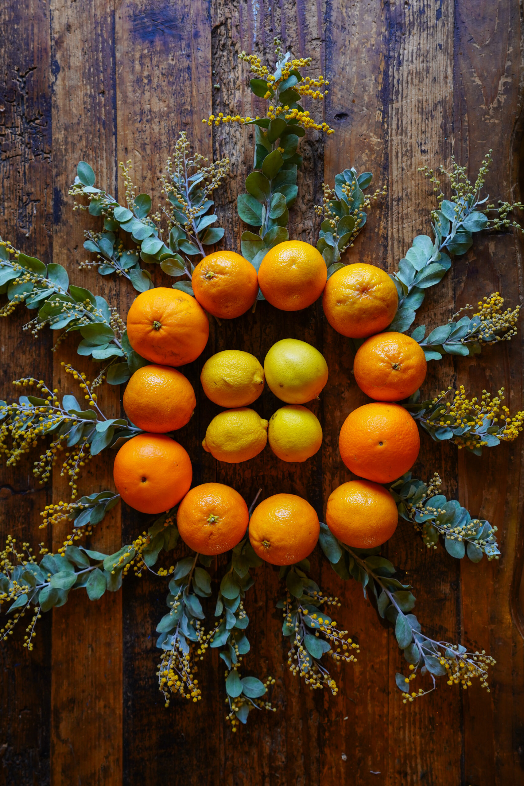 group of oranges and lemons