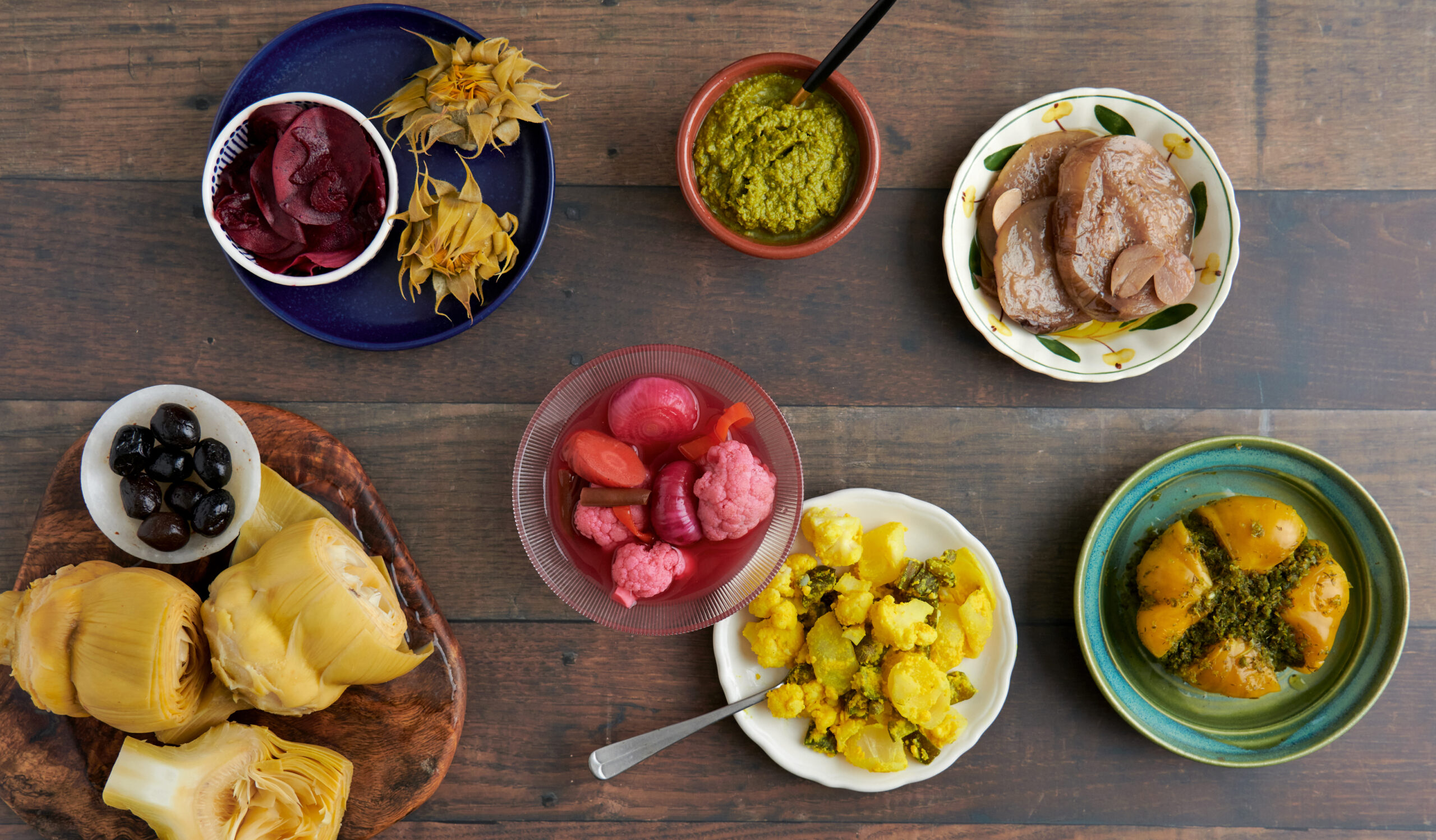 bowls and plates of fruit and vegetables for fermentation