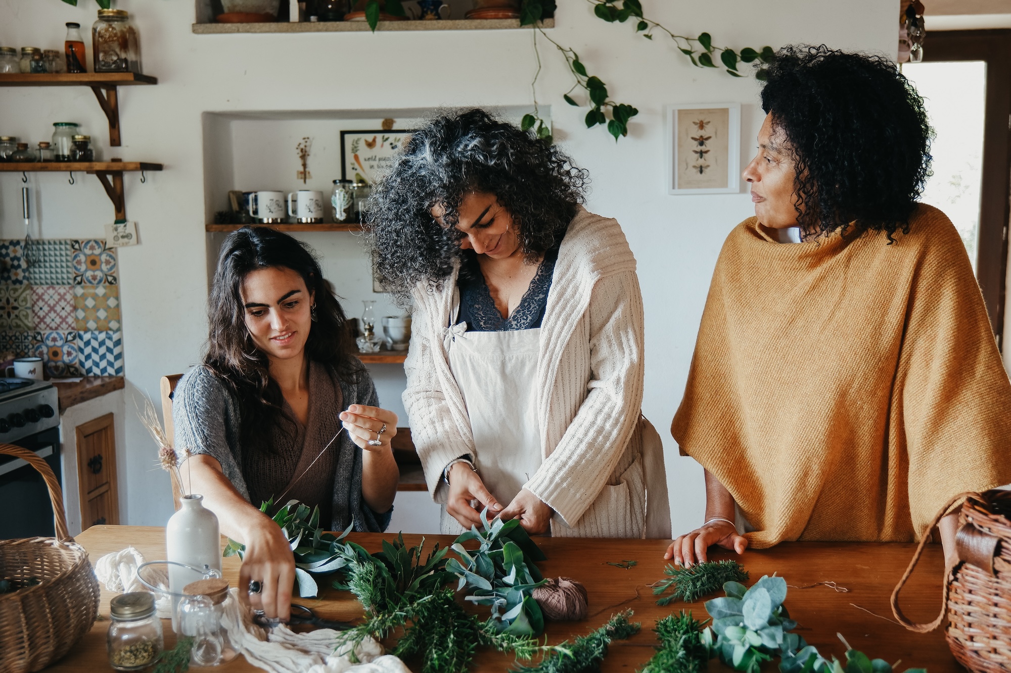 plant people making herbal preparations