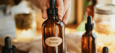 Tinctured bottle labeled "herbal bitters"