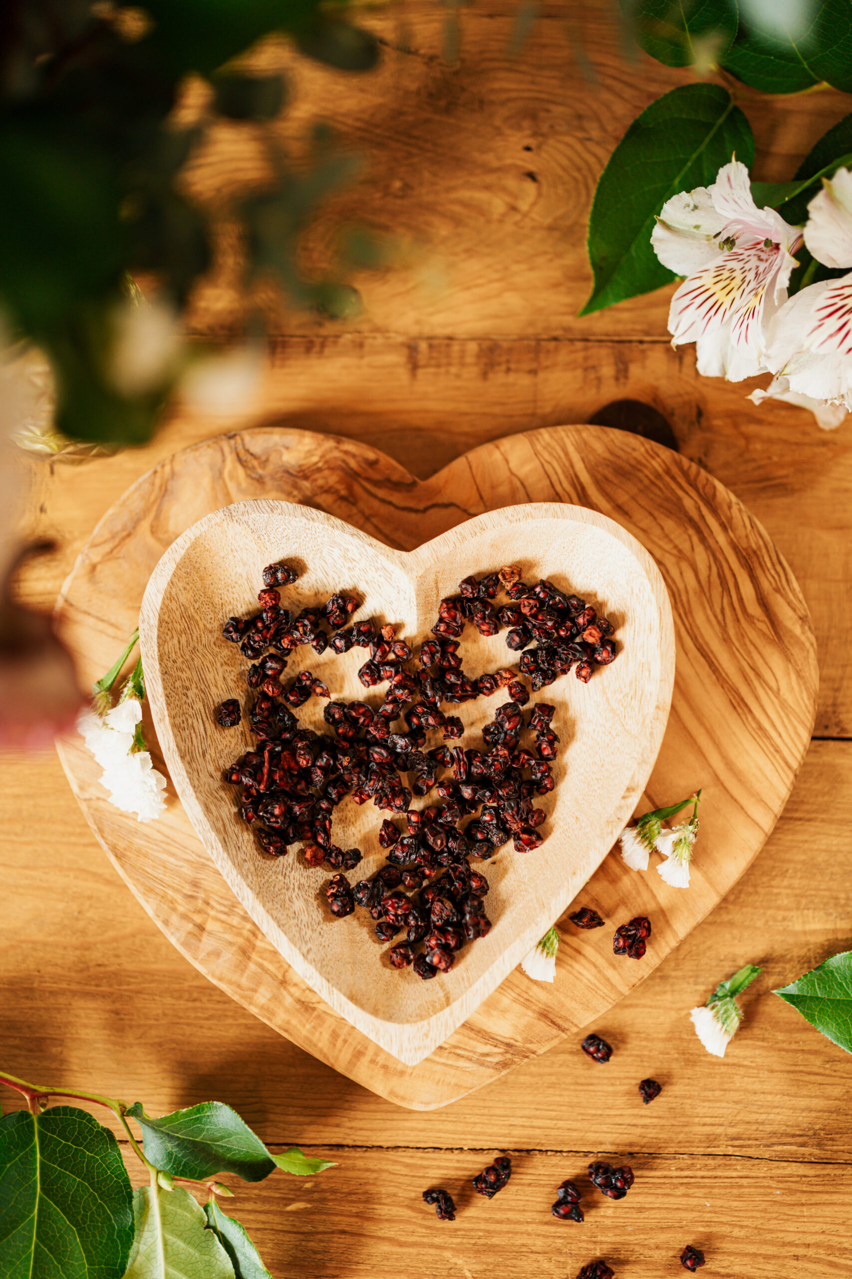 schisandra berries in a heart-shaped bowl